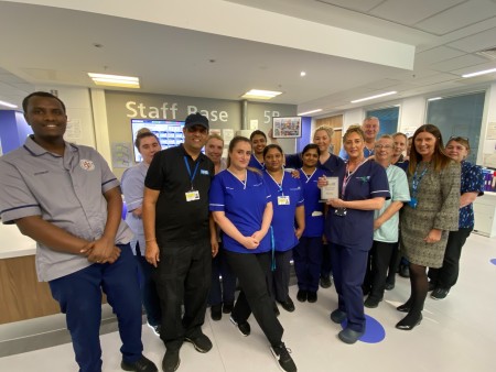 Ward 5B at their staff base with their Team of the Month Award 