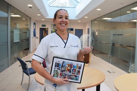 Jo Fortune with her employee of the month award 