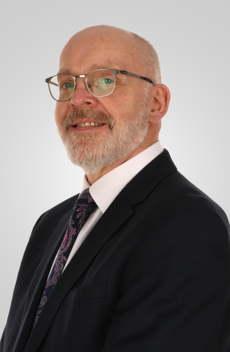 Professor Terry Jones smiling to camera. Prof Jones is Director of Research at UHLG and Cheshire and Merseyside Integrated Care System, will lead the Liverpool CRDC.